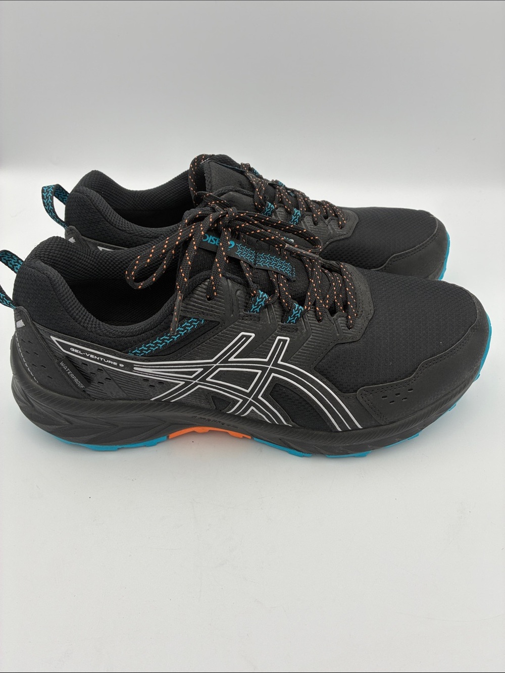 Men’s ASICS Black Athletic Trail Shoes with Teal & Orange Accents Waterproof